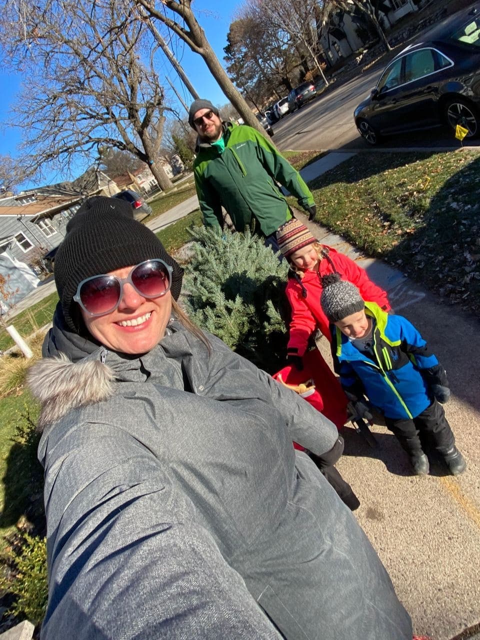 We continued our tradition this year - walked our Christmas tree home from a local coffee shop the day after Thanksgiving.