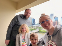 On our balcony at our hotel overlooking the Colorado River and Austin.