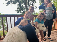 Leo (the dog) is very patient with all the kids that love him.