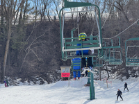 Brennan got so comfortable on the chair lift that he went up by himself.